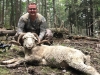 Hunter posing with Rocky Mountain Ram kill