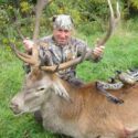 Man Posing With Shot Deer