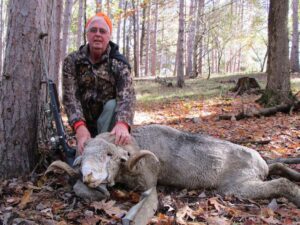 Hunter with Rocky Mountain Ram kill