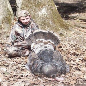 Kid with turkey kill