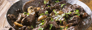 cooked venison ragout in a pan