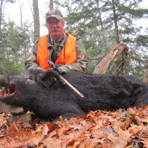 Man Posing with Hunted Boar