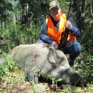 Man Posing with Hunted Boar