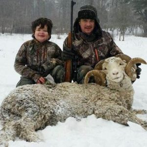 Two Hunters with Rocky Mountain Ram