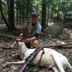Hunter with Fallow Deer