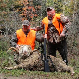 Two Hunters with Rocky Mountain Ram