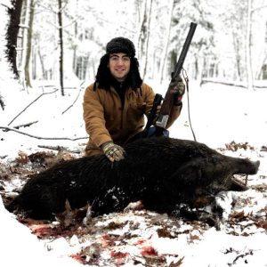 Man Posing With Trophy Boar