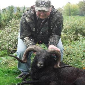 Male Hunter with Black Hawaiian Ram