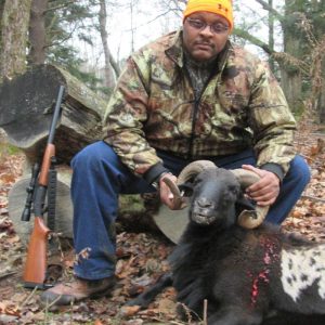 Male Hunter with Black Hawaiian Ram