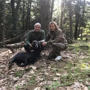 Male and Female Hunters with Black Hawaiian Ram
