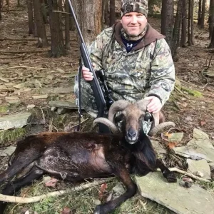Male Hunter with Black Hawaiian Ram