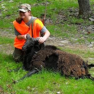 Female Hunter with Black Hawaiian Ram