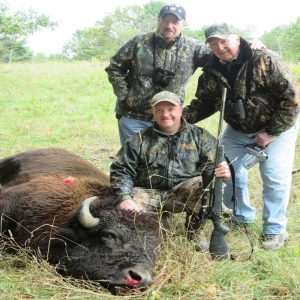 Three Hunters with Buffalo
