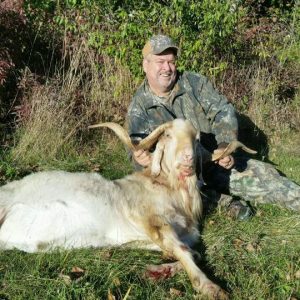 Man with Hunted Spanish Goat