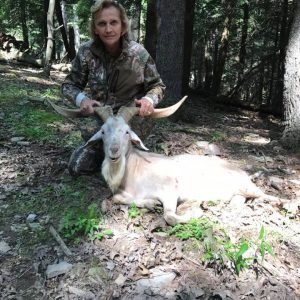 Woman with Spanish Goat she Hunted
