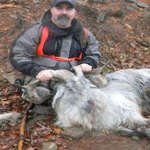 Man with Hunted Spanish Goat