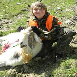 Young Male with Spanish Goat