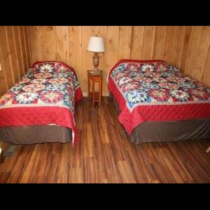 Twin bed & Queen Bed inside Tioga Ranch Hunting Lodge